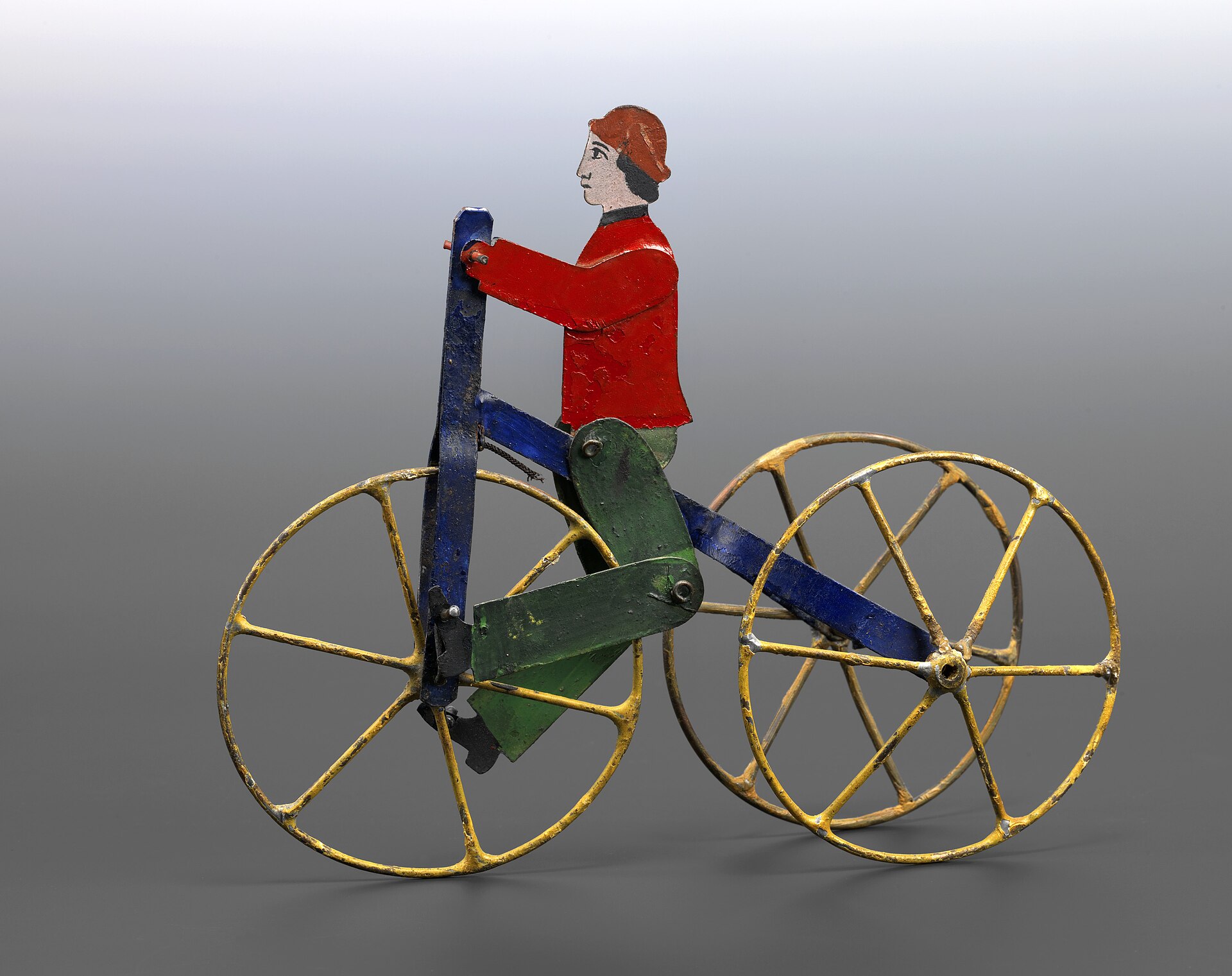 Ernest Santin's 1869 patent model of a toy bicycle rider